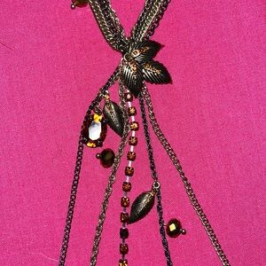 Multi chain, bronze colored Betsey Johnson necklace